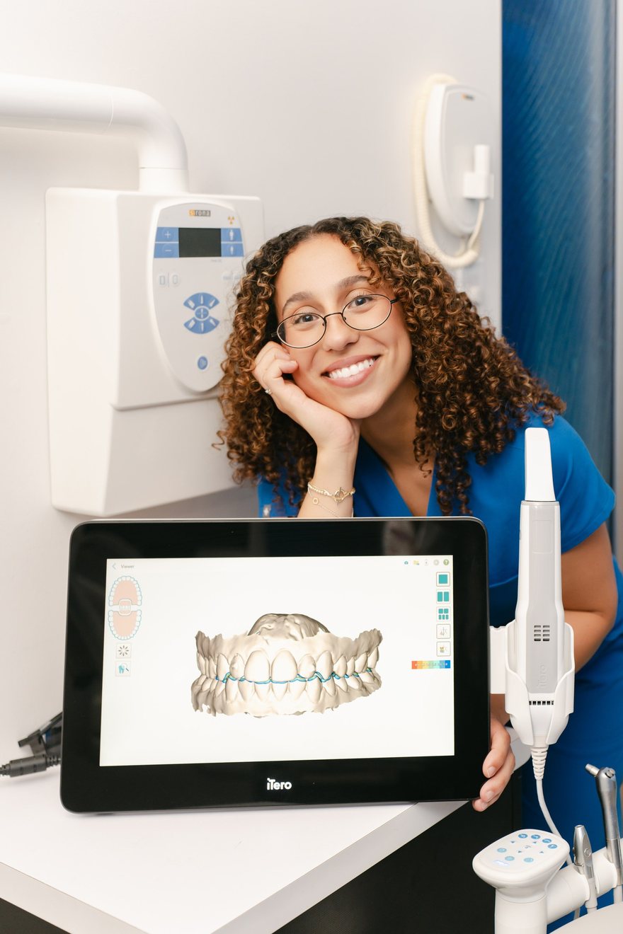 A Downtown Orthodontics team member with the chairside scanner