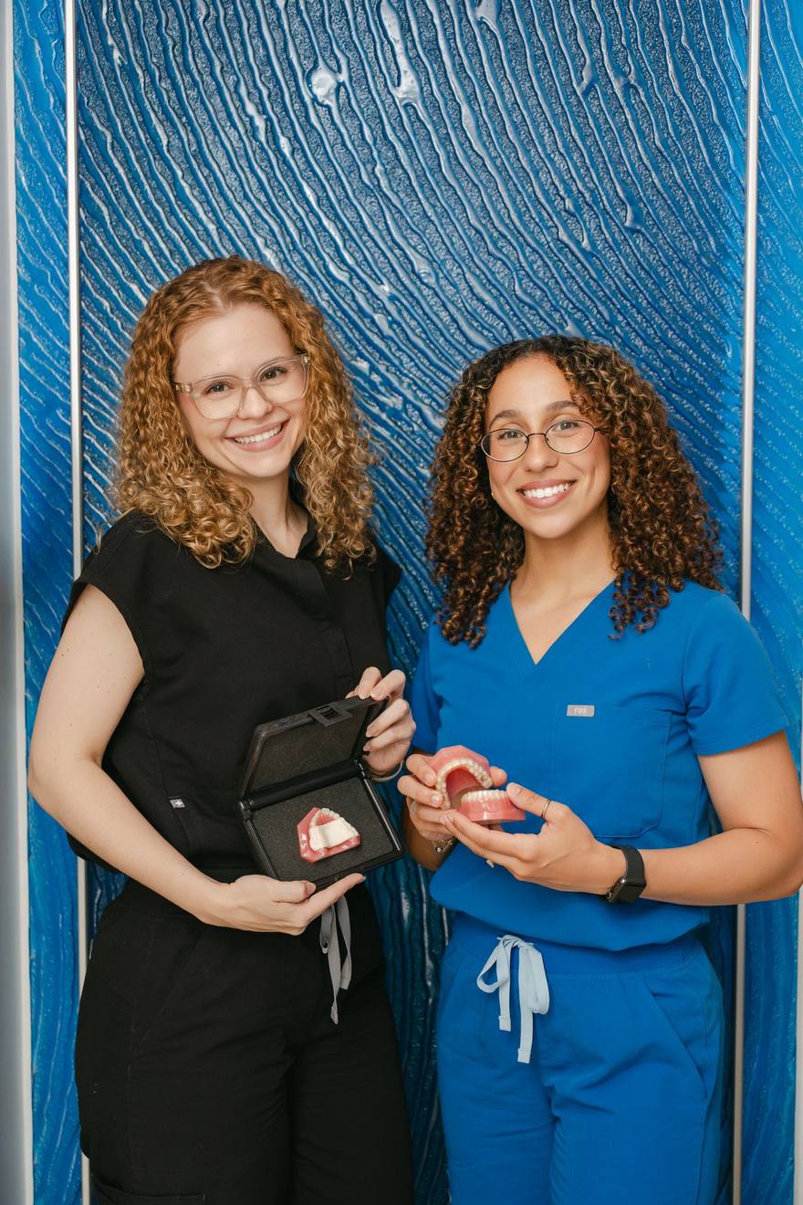 Two members of the Downtown Orthodontics team at the practice